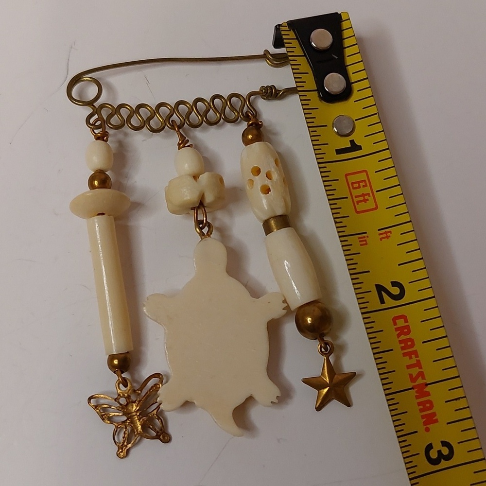 Vintage Carved Bone and Brass Dangling Charms Brooch Pin - Picture 5 of 6
